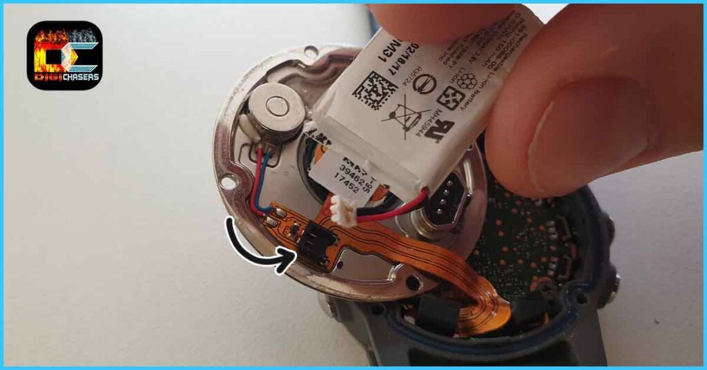 Unplug the battery connector from the watch