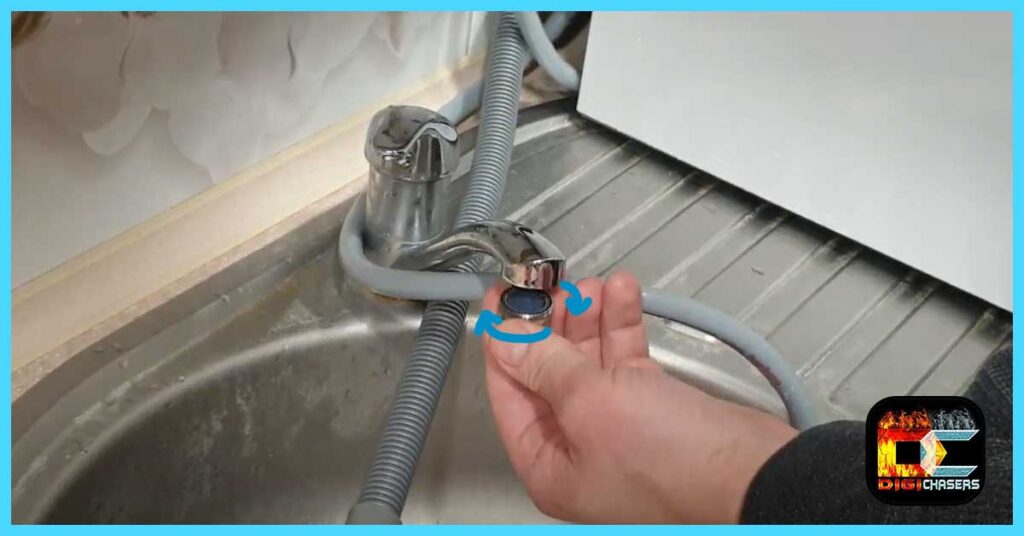 unscrewing faucet aerator